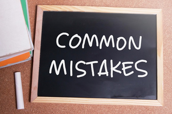 Common Mistakes quote written on a small chalkboard